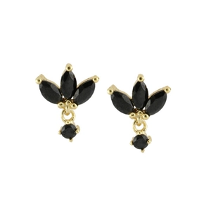 Detailed close-up of leaf-shaped gold drop earrings with black marquise cut gemstones