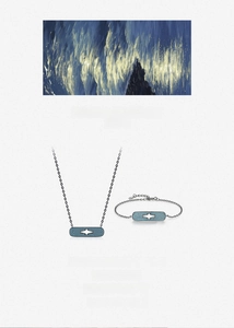 Detailed view of S925 sterling silver starburst necklace and bracelet set with blue stones