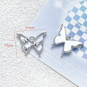 Detail showing dimensions of silver butterfly pendant charms for jewelry making
