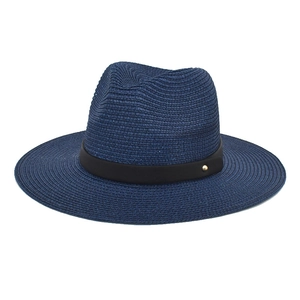 Close-up of blue-purple paper straw hat with black ribbon and gold metal stud detail
