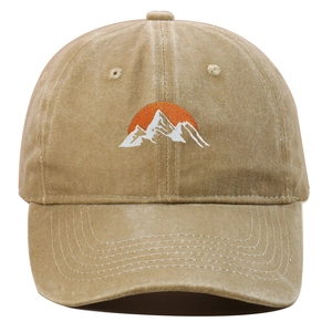 Classic washed cotton baseball cap featuring mountain embroidery and sunset detail
