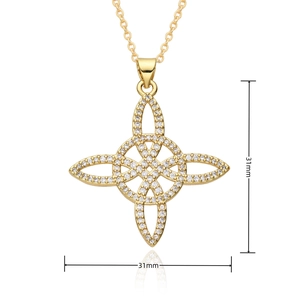 Macro detail of 31mm gold Celtic knot necklace pendant with shimmering zircon pavé stones