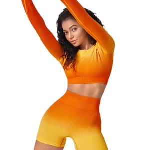 Seamless ribbed yoga set with orange yellow gradient crop top and high waist shorts