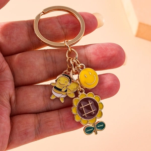 Pastoral bee and sunflower keychain with colorful enamel charms for bags and phones