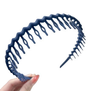 Non-slip navy blue wavy headband with matte finish for secure hair styling