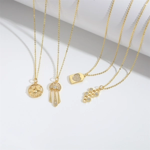 Minimalist gold necklace collection with compass star, heart and geometric pendants