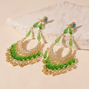 Bohemian gold earrings with vintage green crystal water drops and sparkling rhinestones