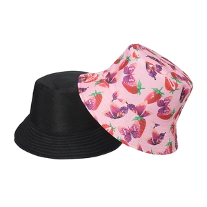 Detail view of black and pink strawberry butterfly print bucket hats with stitched brims