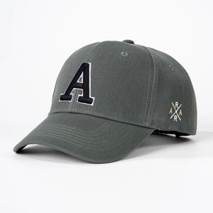 Detail of embroidered letter A on a dark gray twill cotton baseball cap for women