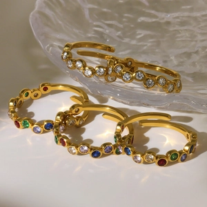 Chic 18K gold plated titanium rings with multi-colored cubic zirconia in a bezel setting