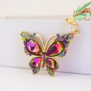Colorful crystal butterfly keychain with iridescent gemstones on gold metal base