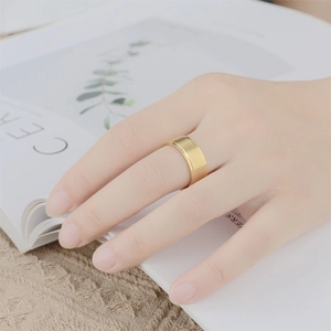 Minimalist matte gold titanium steel ring with polished edges for men and women
