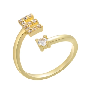 Detailed view of adjustable gold-plated letter E ring with micro-pave cubic zirconia stones