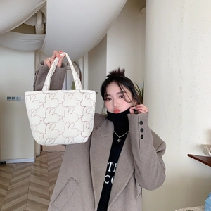 Quilted tote bag with red rabbit print pattern for women in minimalist Korean style