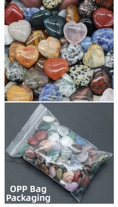 Detail of multi-color heart-shaped natural crystal stones in clear OPP bag packaging