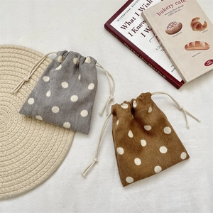 Set of 2 polka dot corduroy drawstring storage bags in grey and brown colors