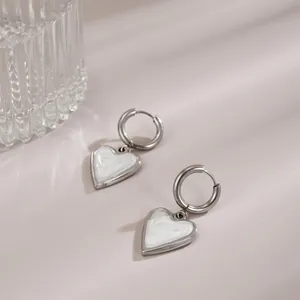 Silver stainless steel hoop earrings with white marble texture heart pendants