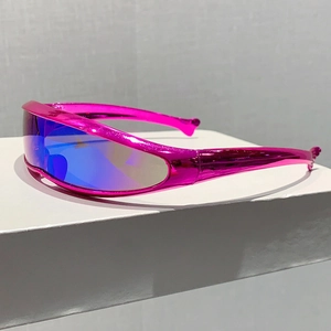 Side view of pink metallic Y2K sports sunglasses with blue reflective lenses on a pedestal