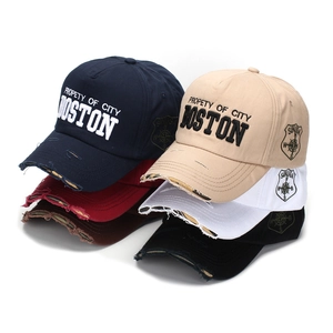 Distressed cotton baseball cap with Boston embroidery in multiple vintage colors