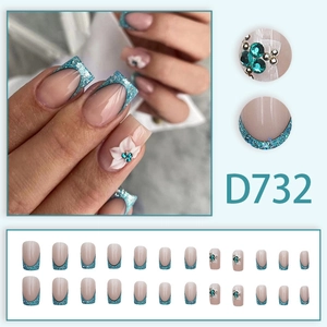Unghie finte french blu glitter con fiori 3D e strass, set da 24 pezzi completo