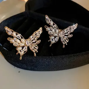 Elegant gold plated butterfly rings with white rhinestones and pearls in a black box