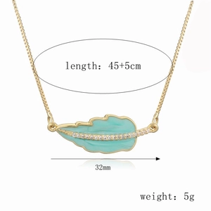 Golden leaf pendant necklace with turquoise enamel and zircon crystals, 45cm length