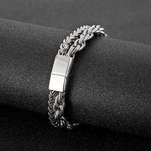 Double-row interwoven punk rock stainless steel chain bracelet for men on display