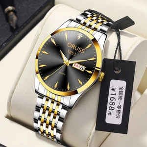 Detail of ORUSS business watch featuring black sunray dial and dual calendar window