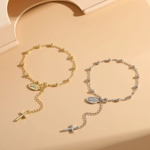 Religious 14K gold and silver rosary bead bracelets with Miraculous Medal and cross charms