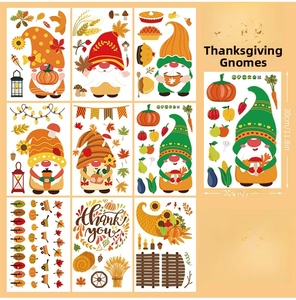 Detail view of 9 sheets of Thanksgiving window clings with pumpkins, gnomes and autumn leaves