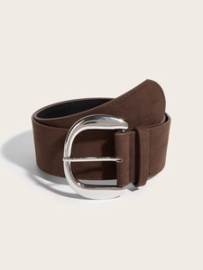 Close-up of brown suede wide belt with a large silver buckle for women dress accessory
