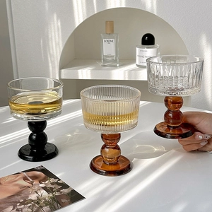 Vintage-style glassware set with unique beaded stems in black and amber colors