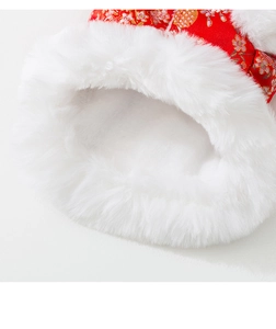 Close-up of traditional Chinese pet vest with red floral silk and thick white plush lining