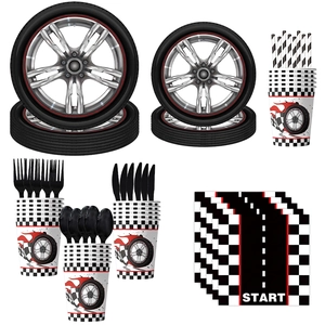 Racing theme party set with tire shaped plates cups and napkins on white background