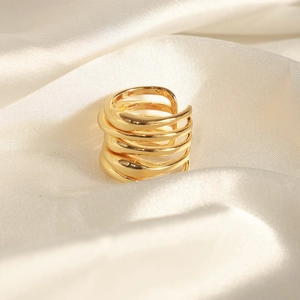 Minimalist gold irregular multi-layer wrap open ring on white silk background
