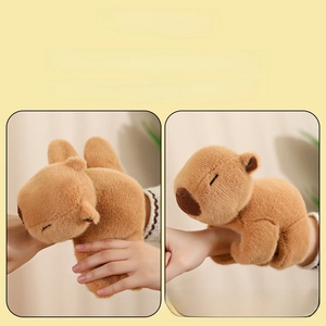 Detail of plush capybara slap bracelet showing soft texture and wrist wrap mechanism
