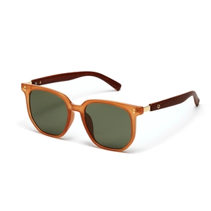 Detail of amber frame sunglasses with brown wood grain temples and green lenses