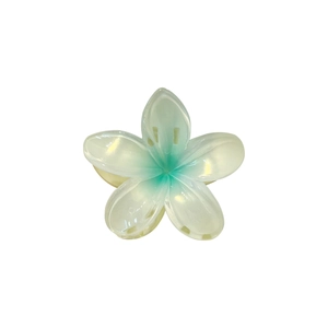 Pastel yellow plumeria flower hair claw clip with green gradient on white background