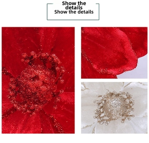 Close-up of red velvet artificial poinsettia flower with glitter edges for Christmas decor