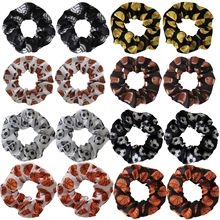 Set of 16 hair scrunchies featuring football, basketball, rugby and softball prints