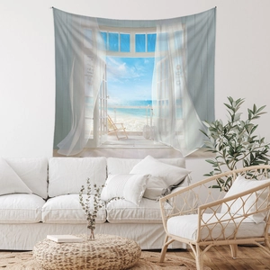Detail view of Bohemian beach scenery wall tapestry in a cozy Nordic style living room