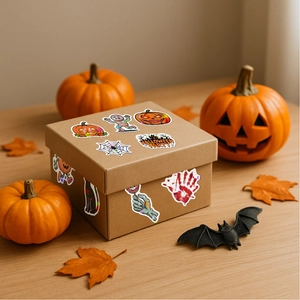 Halloween party stickers on a gift box with pumpkin and maple leaf decorations