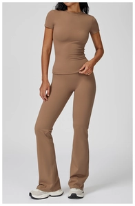 Detailed view of women's brown brushed yoga set with slim fit top and flare leggings