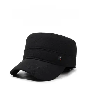 Detail view of the black winter flat top hat featuring a small metal SPORT logo