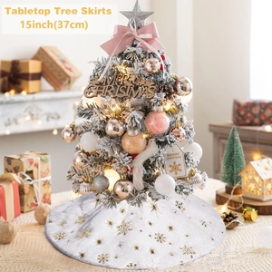 Detail of 15 inch white plush Christmas tree skirt with golden snowflake patterns