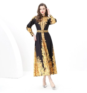 Detailed view of the vintage baroque print and buttoned collar on a luxury maxi dress