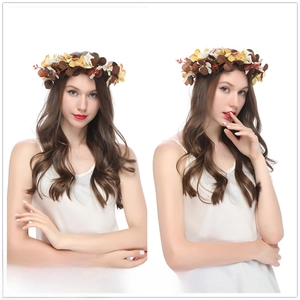 Detailed view of handmade silk flower crown headband with autumn toned floral accents
