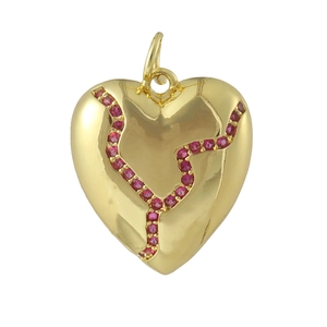 Detailed view of 18K gold-plated heart pendant with red zircon inlay and bow design