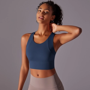 Detail view of high-support navy sports bra and grey-purple high-waisted fitness leggings