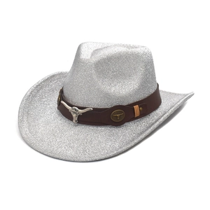 Detail of silver cowboy hat with glitter finish, brown leather band and bull emblem